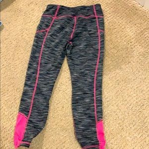 Black,white,and pink leggings size medium (7-8)
